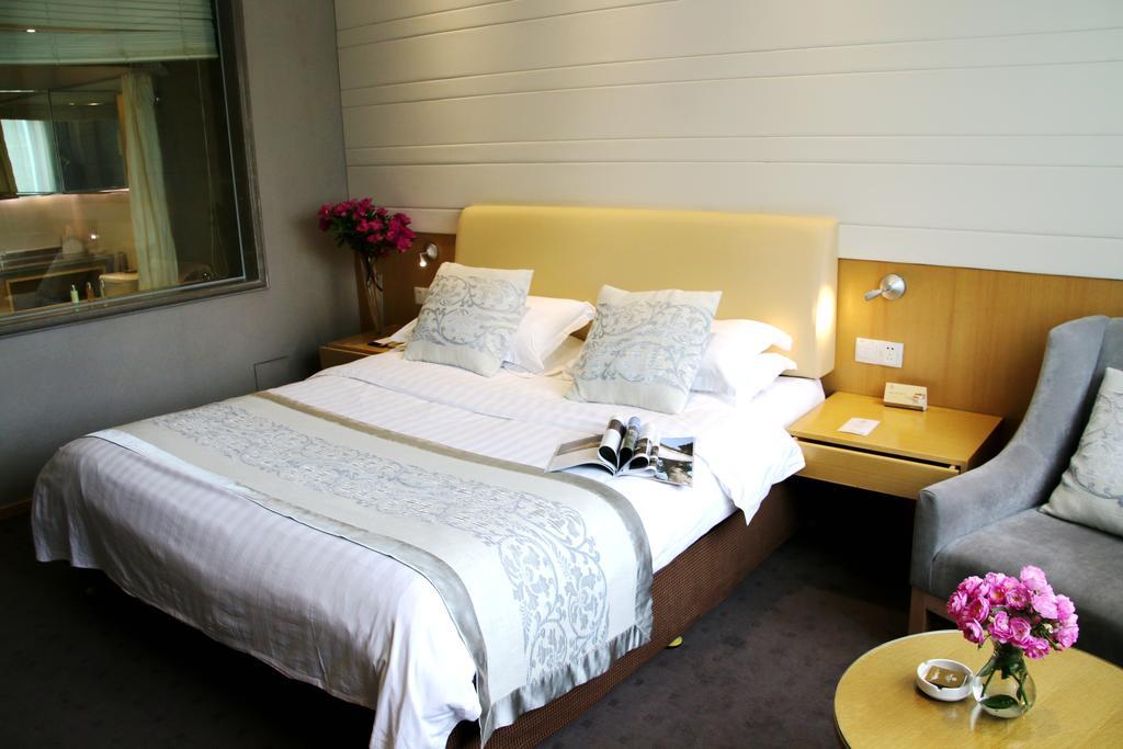International Conference Hotel Of Nanjing Нанкин Номер фото