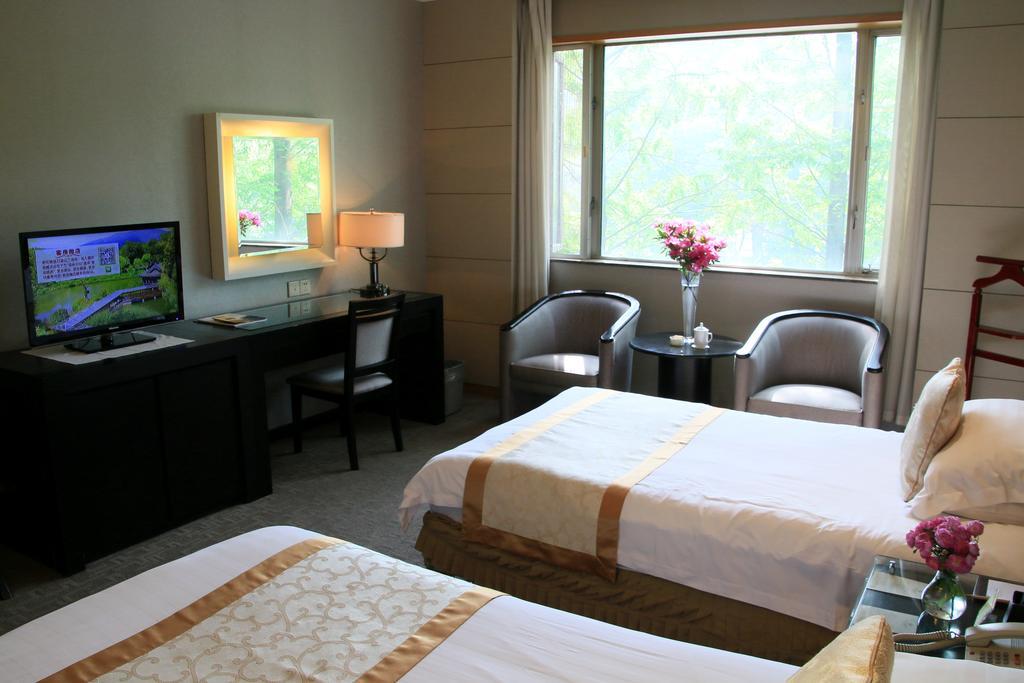 International Conference Hotel Of Nanjing Нанкин Номер фото