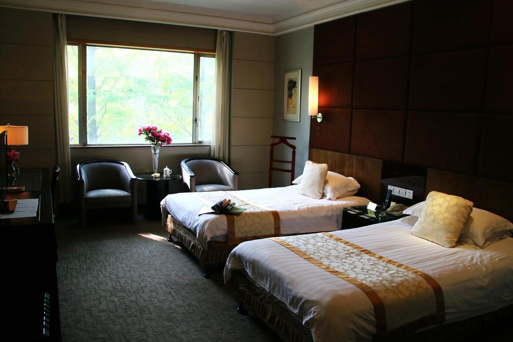 International Conference Hotel Of Nanjing Нанкин Номер фото