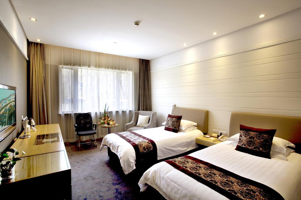 International Conference Hotel Of Nanjing Нанкин Номер фото